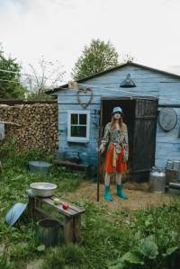 woman with fork in garden