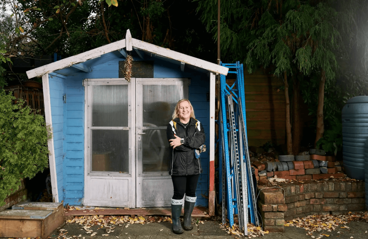 woman in front of garden shed